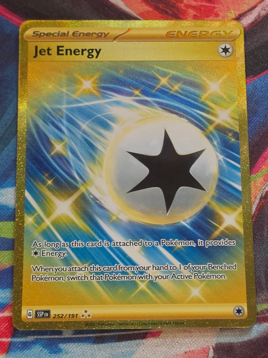 Jet Energy Hyper Rare SV08: Surging Sparks 252/191 NM Pokemon