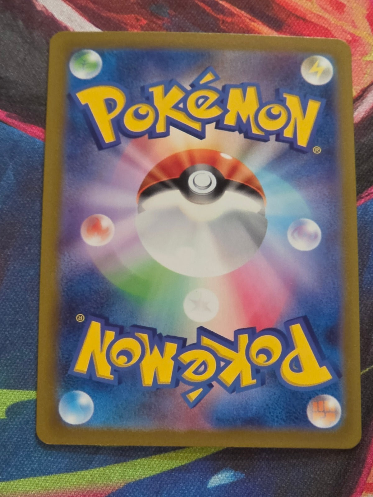 Hitmonchan (Poke Ball Pattern) - 107/165 - SV2a: Pokemon Card 151 - Uncommon - Reverse Holo - LP Japanese Pokemon (Back)