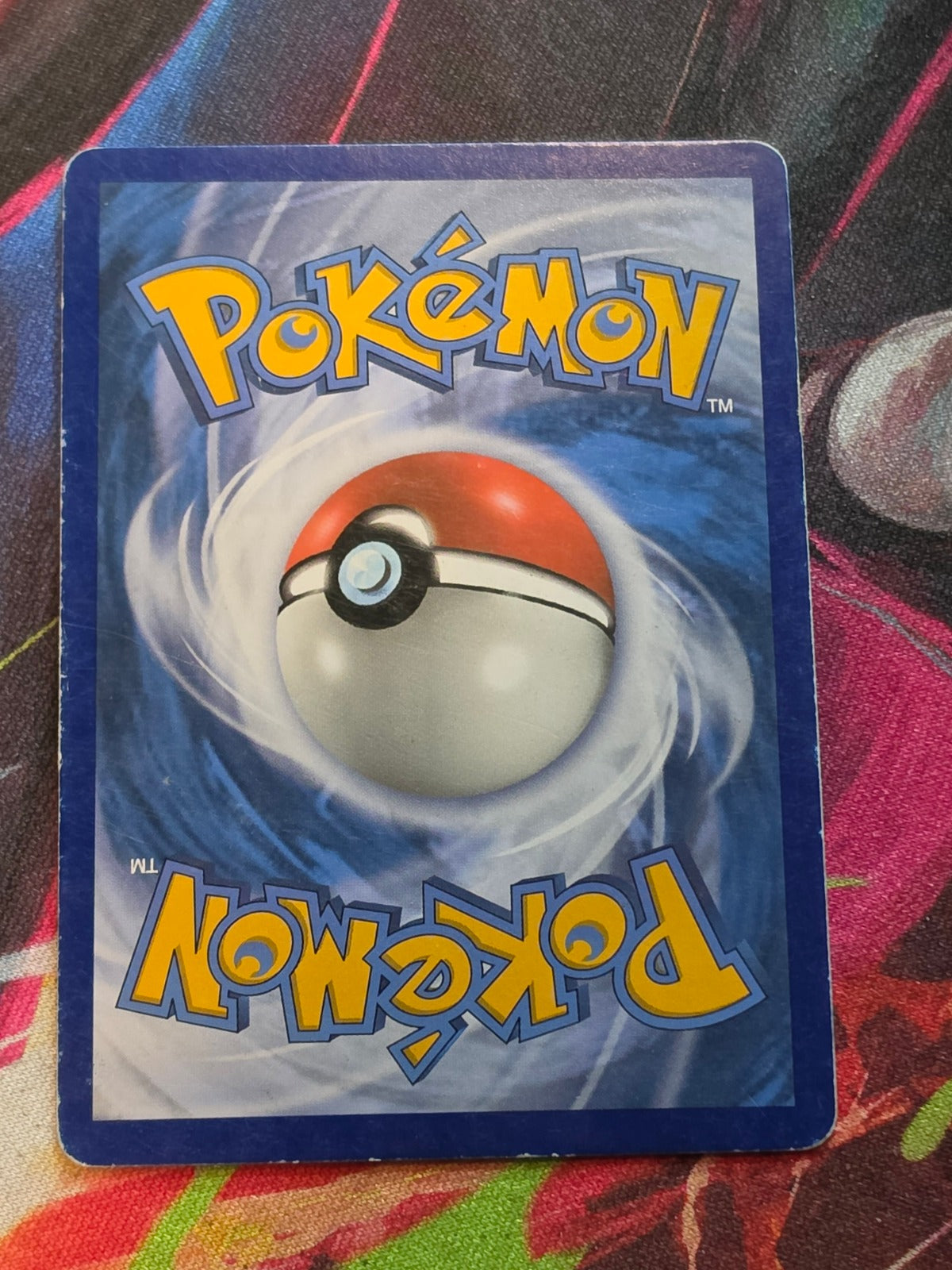 Reshiram & Charizard GX Ultra Rare SM - Unbroken Bonds 20/214 MP+ Pokemon (Back)