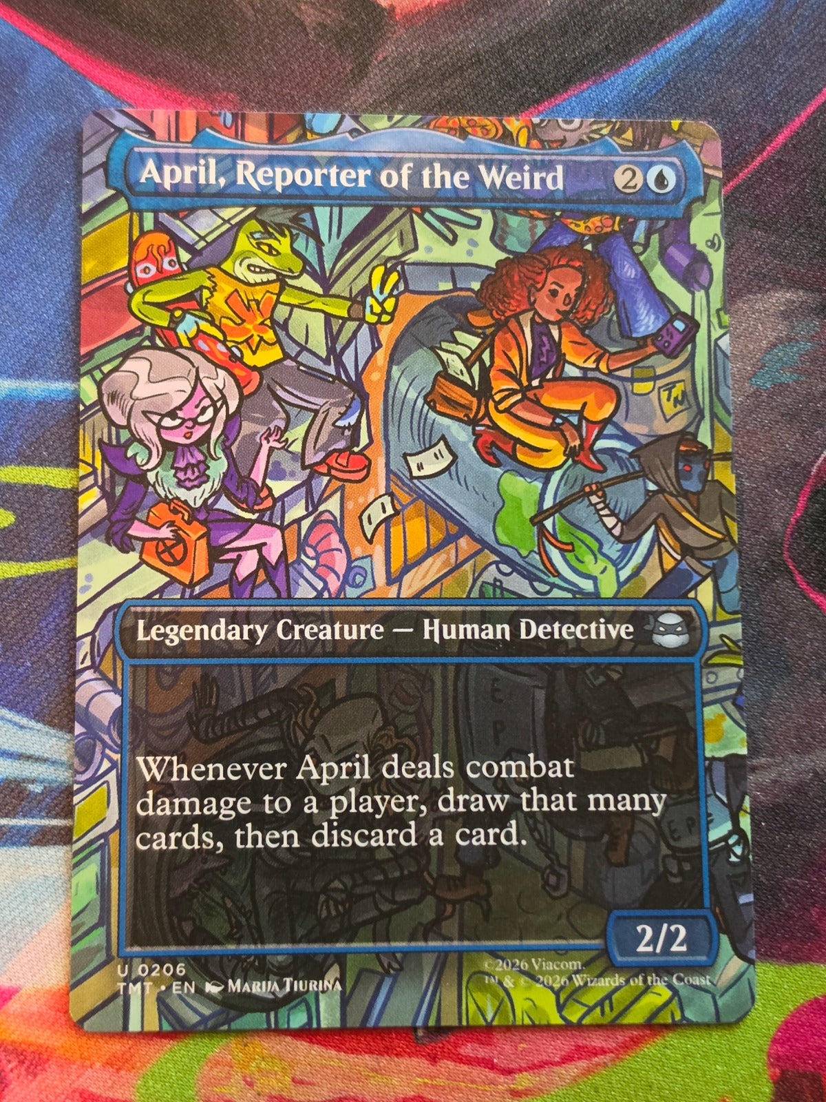 April, Reporter of the Weird (Borderless) - 206 - Teenage Mutant Ninja Turtles - U - NM - MTG