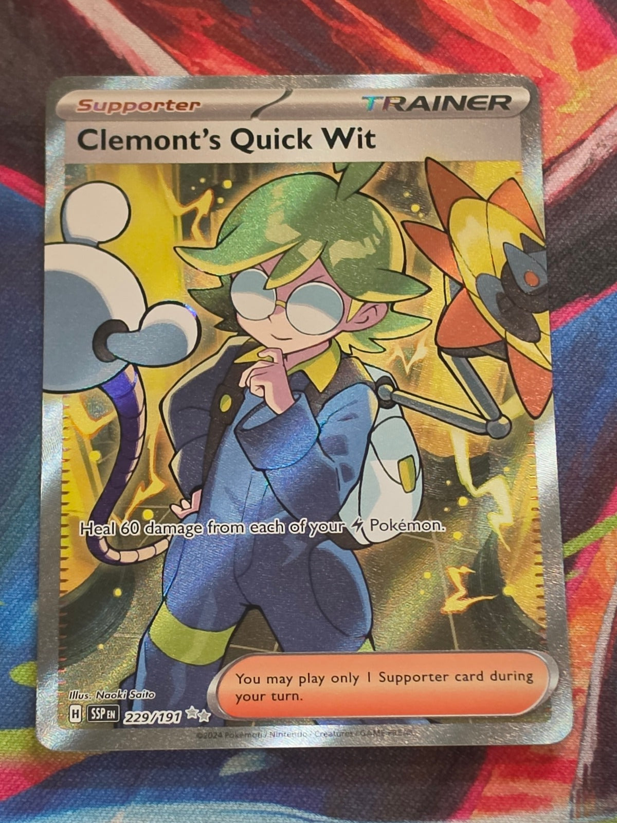 Clemont's Quick Wit Ultra Rare SV08: Surging Sparks 229/191 NM Pokemon