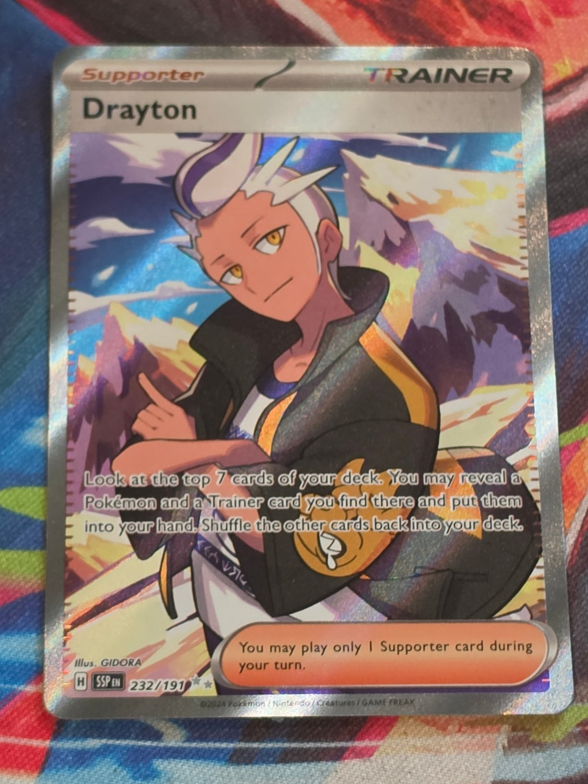 Drayton Ultra Rare SV08: Surging Sparks 232/191 NM Pokemon