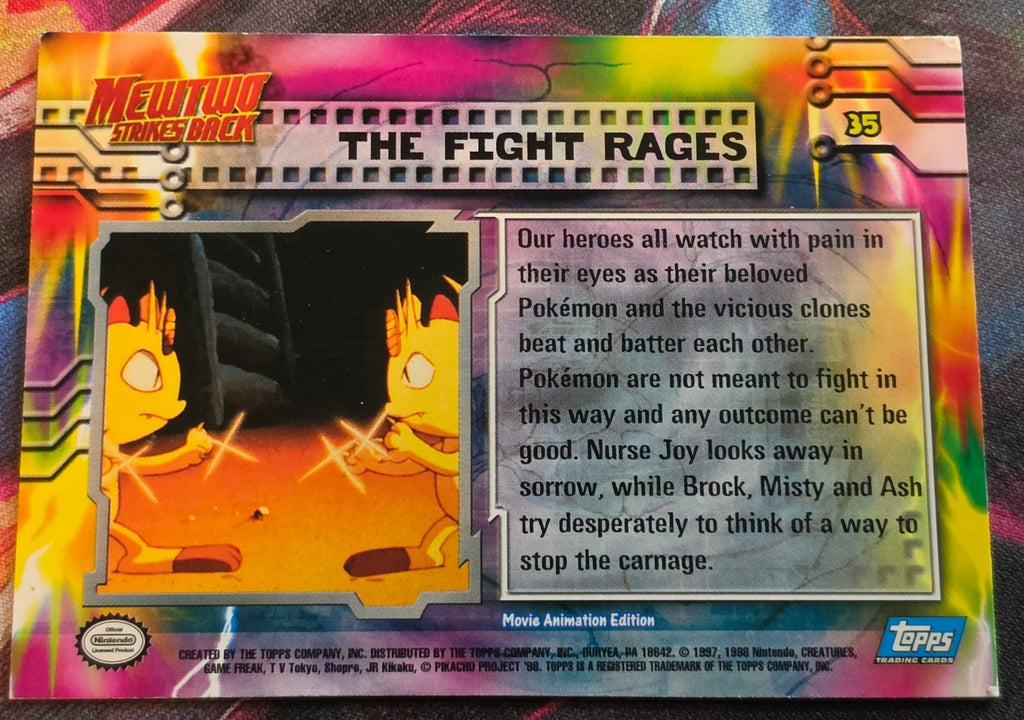 The Fight Rages #35 - 1999 Topps Pokemon The First Movie - NM - Pokemon (Back)
