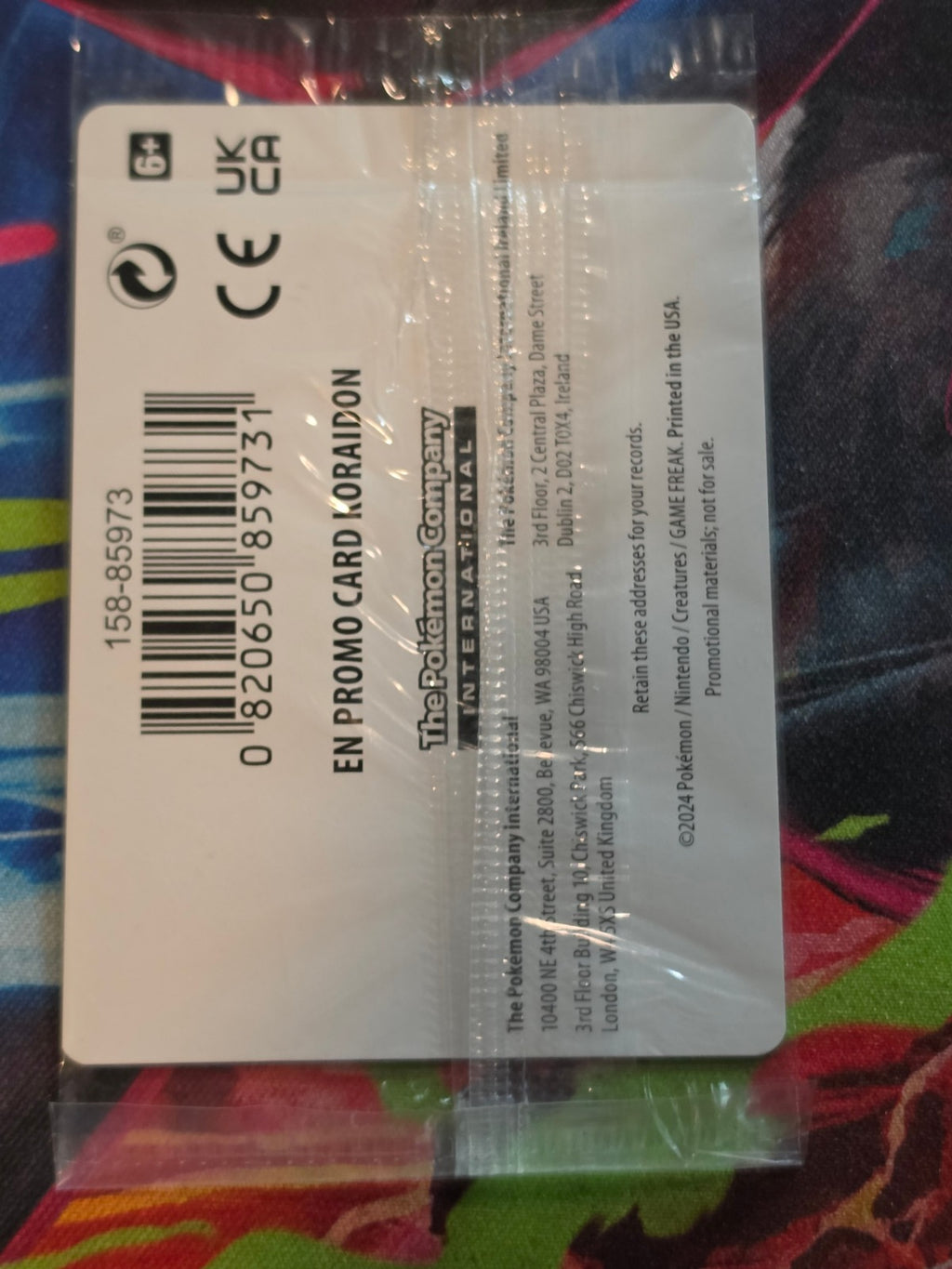 Koraidon (Gamestop Promo) Promo Reverse Holo Miscellaneous Cards & Products 119/162 NM SEALED Pokemon (Back)