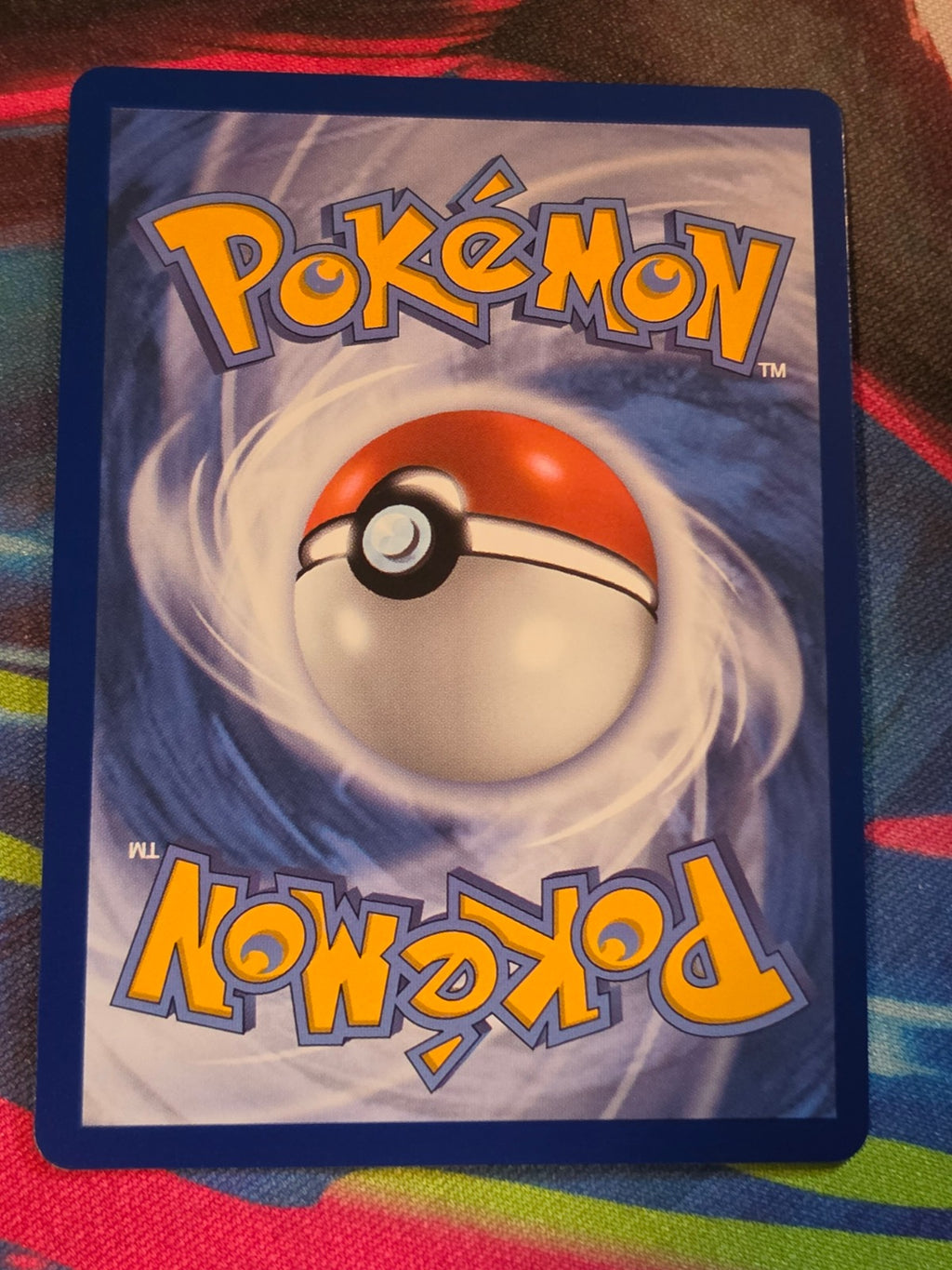 Iron Defender Ultra Rare Pitch Black 110/084 NM Pokemon (Back)