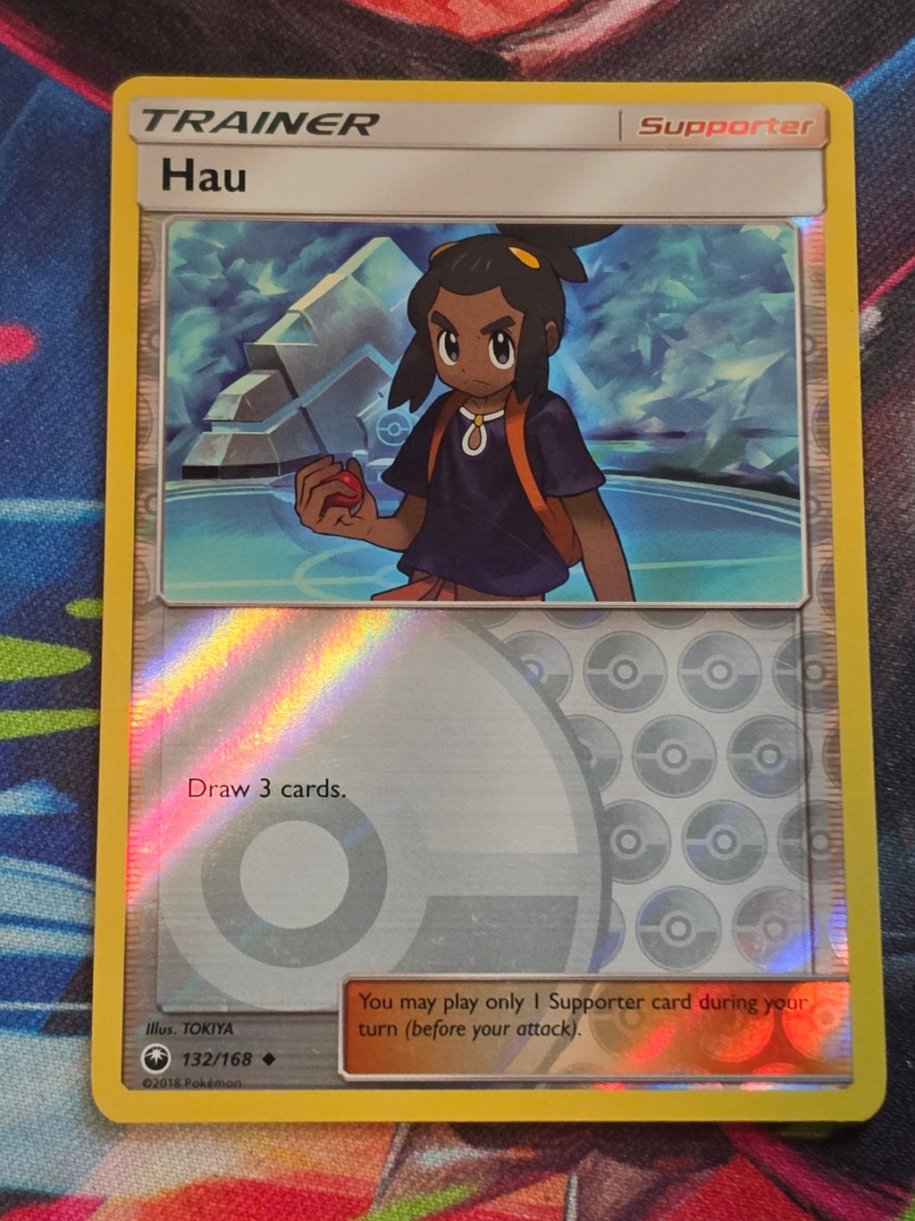 Hau - 132/168 - SM - Celestial Storm - Uncommon - Reverse Holo - LP+ Pokemon